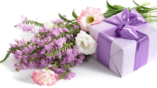 Holidays International Womens Day Bouquet of flowers and a gift for a girl on March 8 057125 